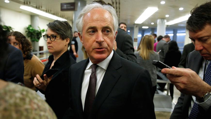 Senator Bob Corker (R-TN) speaks to reporters as he arrives for the weekly Senate Republican policy luncheon on Capitol Hill in Washington, U.S., April 17, 2018.      REUTERS/Joshua Roberts - RC18554A3D70
