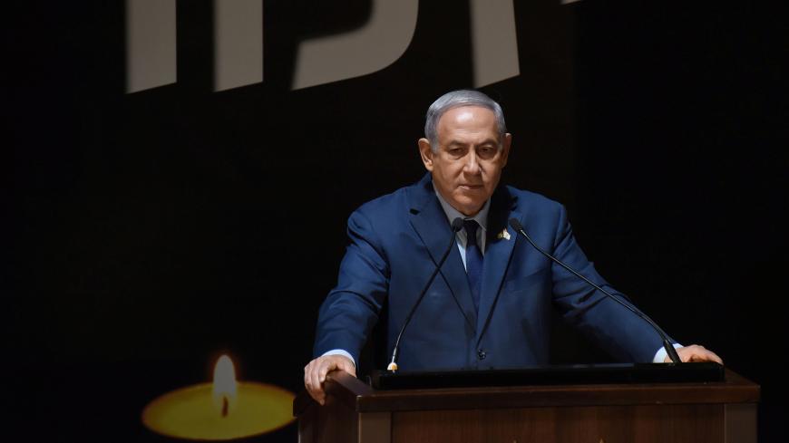 Israeli Prime Minister Benjamin Netanyahu speaks during a Memorial Day ceremony at Mount Herzl military cemetery in Jerusalem, April 18, 2018. Debbie Hill/Pool via Reuters - RC144DAD1110