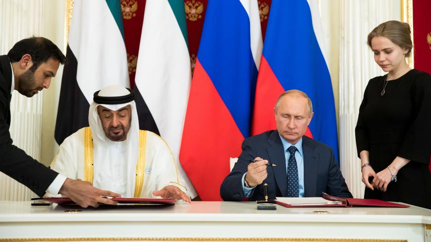 Russian President Vladimir Putin (2nd R) and Abu Dhabi's Crown Prince Sheikh Mohammed bin Zayed al-Nahyan (2nd L) of the United Arab Emirates attend a signing ceremony following the talks at the Kremlin in Moscow, Russia June 1, 2018. Pavel Golovkin/Pool via REUTERS - RC1E233474A0