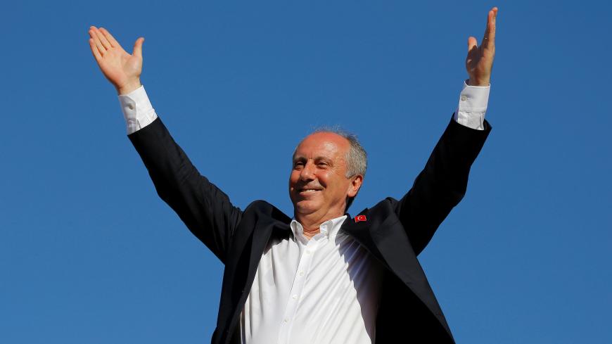 Muharrem Ince, presidential candidate of the main opposition Republican People's Party (CHP), greets his supporters during an election rally in Istanbul, Turkey June 3, 2018. REUTERS/Huseyin Aldemir - RC1C588C4710