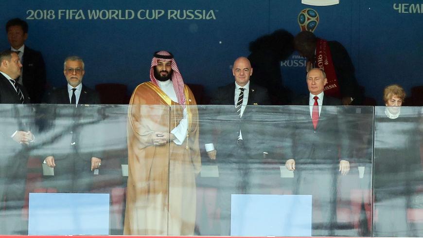 MOSCOW, RUSSIA - JUNE 14:  Mohammed bin Salman of Saudi Arabia, FIFA President Gianni Infantino and President Wladimir Putin of Russia look on during the 2018 FIFA World Cup Russia group A match between Russia and Saudi Arabia at Luzhniki Stadium on June 14, 2018 in Moscow, Russia.  (Photo by Amin Mohammad Jamali/Getty Images)