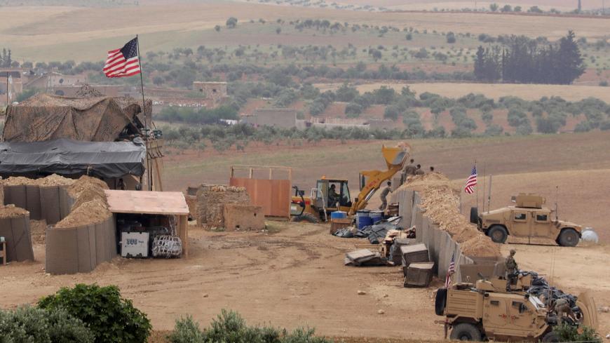 U.S. forces set up a new base in Manbij, Syria May 8, 2018. Picture Taken May 8, 2018. REUTERS/Rodi Said - RC1504520BB0