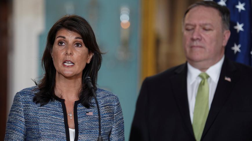 U.S. Ambassador to the United Nations Nikki Haley delivers remarks to the press together with U.S. Secretary of State Mike Pompeo, announcing the U.S.'s withdrawal from the U.N's Human Rights Council at the Department of State in Washington, U.S., June 19, 2018. REUTERS/Toya Sarno Jordan - RC1A7B0F9990