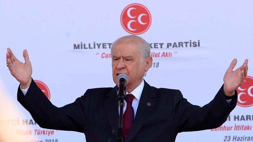 Leader of Turkey's Nationalist Movement Party (MHP) Devlet Bahceli gestures as he addresses his supporters during an election rally in Ankara on June 23, 2018. - Turkey is preparing for tight presidential and parliamentary elections on June 24, while many analysts say the incumbent President wants a major foreign policy success to give him a final boost. (Photo by ADEM ALTAN / AFP)        (Photo credit should read ADEM ALTAN/AFP/Getty Images)