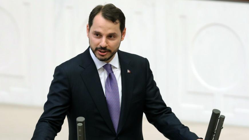 Turkey's newly appointed Minister of Treasury and Finance Berat Albayrak swears in at the Grand National Assembly of Turkey (TBMM) in Ankara, Turkey on July 10, 2018. (Photo by ADEM ALTAN / AFP)        (Photo credit should read ADEM ALTAN/AFP/Getty Images)