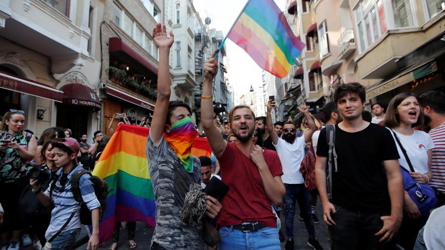 Members of LGBT community take part in a Gay Pride parade in central Istanbul, Turkey, July 1, 2018. REUTERS/Osman Orsal - RC1A989D9800