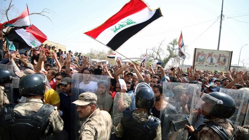 Protesters gather near the main provincial government building in Basra, Iraq July 15, 2018. REUTERS/Essam al-Sudani - RC1D424AA860