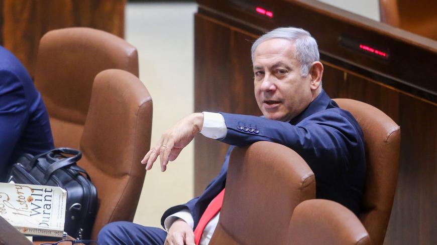 Israeli Prime Minister Benjamin Netanyahu attends the Knesset Plenary Hall session ahead of the vote on the National Law on late July 18, 2018. - Israel's parliament adopted a law defining the country as the nation state of the Jewish people, provoking fears it could lead to blatant discrimination against Arab citizens. (Photo by Marc Israel Sellem / AFP) / Israel OUT        (Photo credit should read MARC ISRAEL SELLEM/AFP/Getty Images)