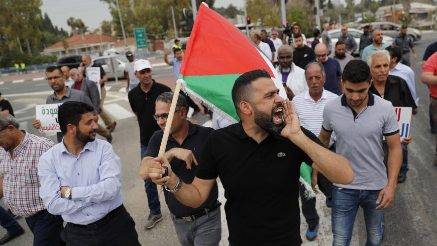 Palestinians and Arab Israelis demonstrate in solidarity with protests in the Gaza Strip on May 4, 2018 near the Erez crossing point with Gaza. - Hundreds of Palestinians began gathering along the Gaza Strips border with Israel for a sixth consecutive Friday of mass protests following violence in which dozens of Gazans have been killed by Israeli forces. (Photo by AHMAD GHARABLI / AFP)        (Photo credit should read AHMAD GHARABLI/AFP/Getty Images)