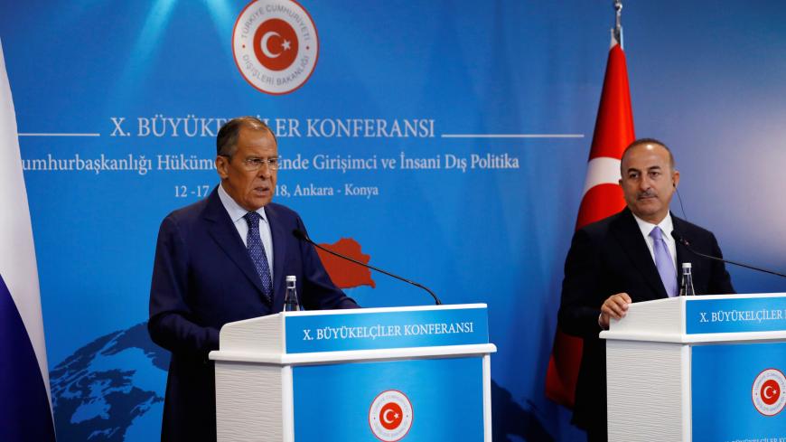 Russian Foreign Minister Sergei Lavrov and his Turkish counterpart Mevlut Cavusoglu attend a news conference in Ankara, Turkey, August 14, 2018. REUTERS/Umit Bektas - RC14B67E5FF0