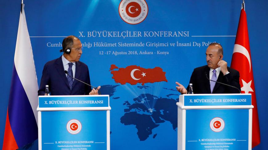 Russian Foreign Minister Sergei Lavrov and his Turkish counterpart Mevlut Cavusoglu attend a news conference in Ankara, Turkey, August 14, 2018. REUTERS/Umit Bektas - RC180FCCDBD0