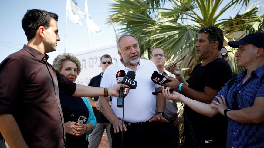 Israeli Defense Minister Avigdor Lieberman visits the southern Kibbutz of Or HaNer, on the Israeli side of the Israel-Gaza border, July 27, 2018. REUTERS/Amir Cohen - RC17D7A3DDA0