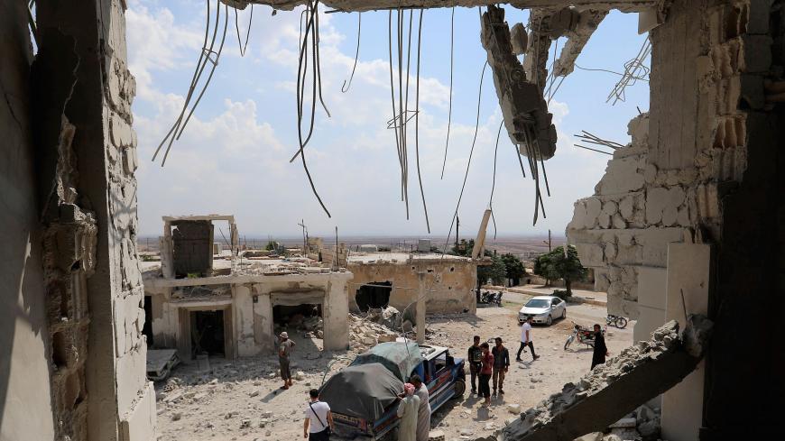 TOPSHOT - This picture shows the destructions after govenrment forces' bombings in the town of Al Habit on the southern edges of the rebel-held Idlib province on September 9, 2018. - Russian air strikes on Syria's last major rebel bastion today were the "most violent" in a month since Damascus and its ally Moscow started threatening it with an imminent attack around a month ago, a monitor said. (Photo by OMAR HAJ KADOUR / AFP)        (Photo credit should read OMAR HAJ KADOUR/AFP/Getty Images)