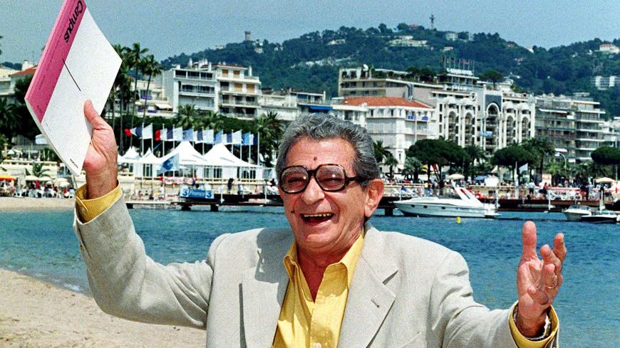 Egyptian director Youssef Chahine poses on the beach as the 51st Cannes Film Festival continues May 20. Chahine, who has participated five times with official entries in Cannes, attends this year's festival to give a lecture on cinematography.

JES/EB - RP1DRIEPXAAB