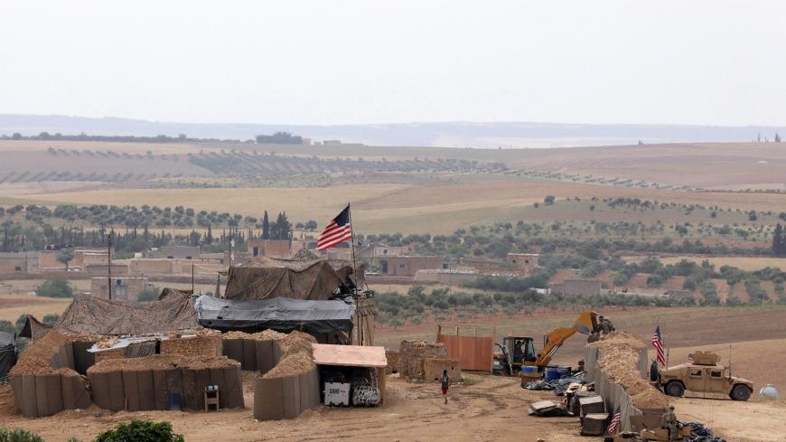 U.S. forces set up a new base in Manbij, Syria May 8, 2018. Picture Taken May 8, 2018. REUTERS/Rodi Said - RC172453D3E0