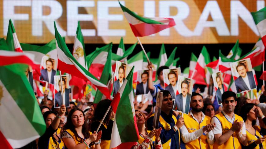 Supporters of Maryam Rajavi, president-elect of the National Council of Resistance of Iran (NCRI), attend a rally in Villepinte, near Paris, France, June 30, 2018.  REUTERS/Regis Duvignau - RC17E035C2B0