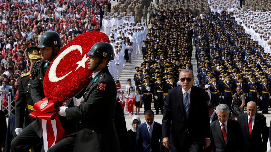 Turkish President Tayyip Erdogan attends a ceremony marking the 96th anniversary of Victory Day at the mausoleum of Mustafa Kemal Ataturk in Ankara, Turkey August 30, 2018. REUTERS/Umit Bektas - RC123071A6A0