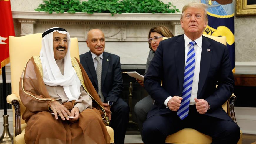 U.S. President Donald Trump meets with the Emir of Kuwait Sheikh Sabah al-Ahmad al-Jaber al-Sabah at the White House in Washington, U.S., September 5, 2018. REUTERS/Kevin Lamarque - RC1CF8BD1230