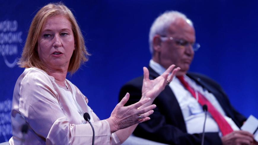 Former Israeli Foreign Minister Tzipi Livni (L) and Chief Palestinian Negotiator Saeb Erekat participate in the World Economic Forum on the Middle East and North Africa at the King Hussein Convention Centre at the Dead Sea May 20, 2017. REUTERS/Muhammad Hamed - RC1E86B4ECD0