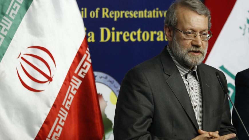 Iran's parliament speaker Ali Larijani speaks during a news conference in Baghdad December 24, 2014. REUTERS/Thaier Al-Sudani (IRAQ - Tags: POLITICS) - GM1EACO1I3601