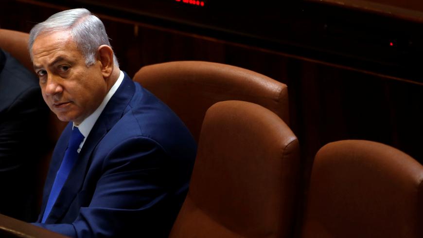 Israeli Prime Minister Benjamin Netanyahu attends a session of the plenum of the Knesset, the Israeli Parliament, in Jerusalem, March 12, 2018. REUTERS/Ronen Zvulun - RC1C0029F120