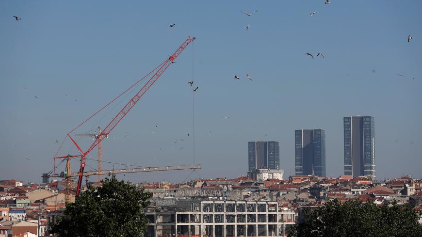 A crane is seen at the construction site of a new building in Zeytinburnu, a middle-class residential neighborhood of  Istanbul, Turkey September 24, 2018. Picture taken September 24, 2018. REUTERS/Murad Sezer - RC1742CAB9D0