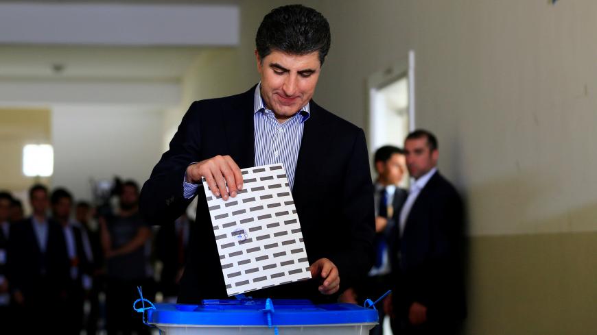 Kurdistan Regional Government Prime Minister Nechirvan Barzani casts his vote at a polling station, during parliamentary elections in the semi-autonomous region in Erbil, Iraq September 30, 2018. REUTERS/Thaier Al-Sudani - RC16F7414BF0