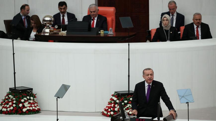 Turkey's President Tayyip Erdogan addresses members of parliament as he attends the reopenning of the Turkish parliament after the summer recess in Ankara, Turkey, October 1, 2018. REUTERS/Umit Bektas - RC17E56F7730