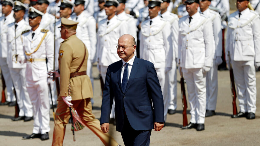 Barham Salih, Iraq's newly elected President walks during a handover ceremony at Salam Palace in Baghdad, Iraq October 3, 2018. REUTERS/Thaier Al-Sudani - RC1B3C02FD00