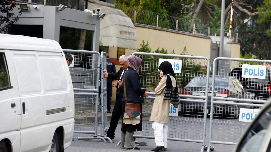 Fiancee (L) of Saudi journalist Jamal Khashoggi and her friend wait outside Saudi Arabia's consulate in Istanbul, Turkey, October 3, 2018. REUTERS/Osman Orsal - RC1D4E9EFA00