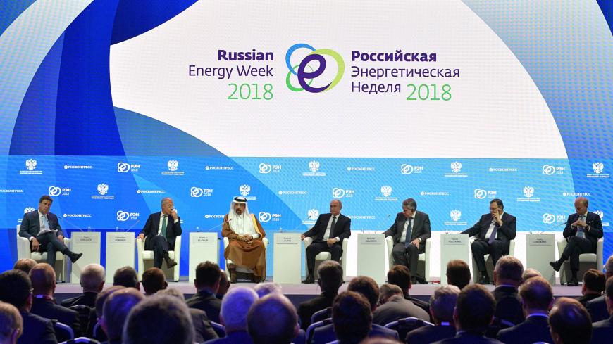 Participants, including Russian President Vladimir Putin (4th R) and Saudi Arabian Energy Minister Khalid al-Falih (3rd L), attend a session of the Russian Energy Week international forum in Moscow, Russia October 3, 2018. Sputnik/Alexei Druzhinin/Kremlin via REUTERS ATTENTION EDITORS - THIS IMAGE WAS PROVIDED BY A THIRD PARTY. - RC111436C470