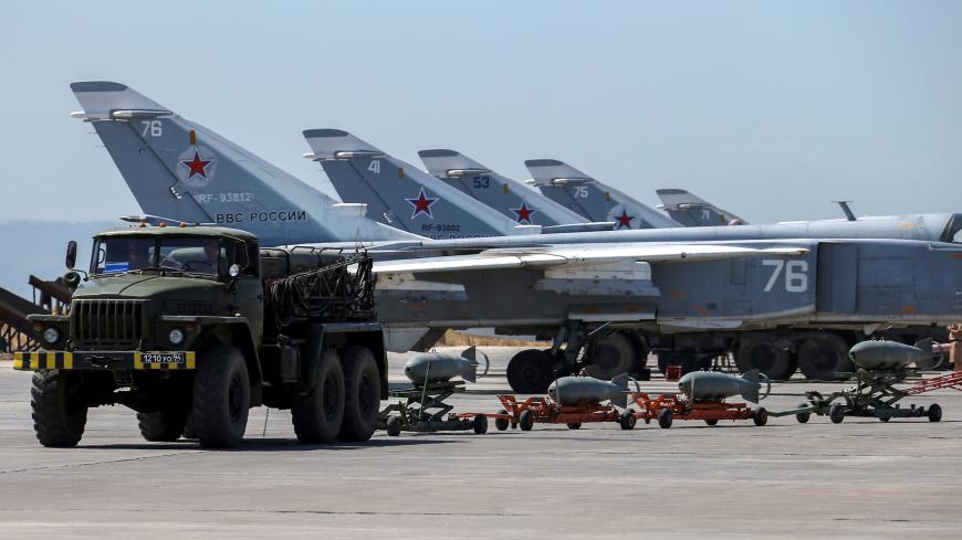 Russian military jets are seen at Hmeymim air base in Syria, June 18, 2016. Picture taken June 18, 2016. REUTERS/Vadim Savitsky/Russian Defense Ministry via Reuters ATTENTION EDITORS - THIS IMAGE WAS PROVIDED BY A THIRD PARTY. EDITORIAL USE ONLY. - S1AETKWCWFAA