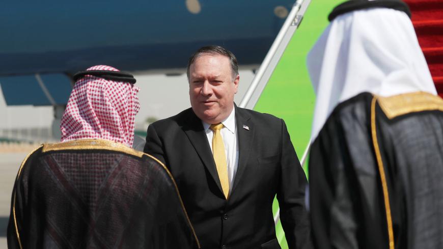 U.S. Secretary of State Mike Pompeo greets Saudi Foreign Minister Adel al-Jubeir after arriving in Riyadh, Saudi Arabia, October 16, 2018. REUTERS/Leah Millis/Pool - RC1B676FE300
