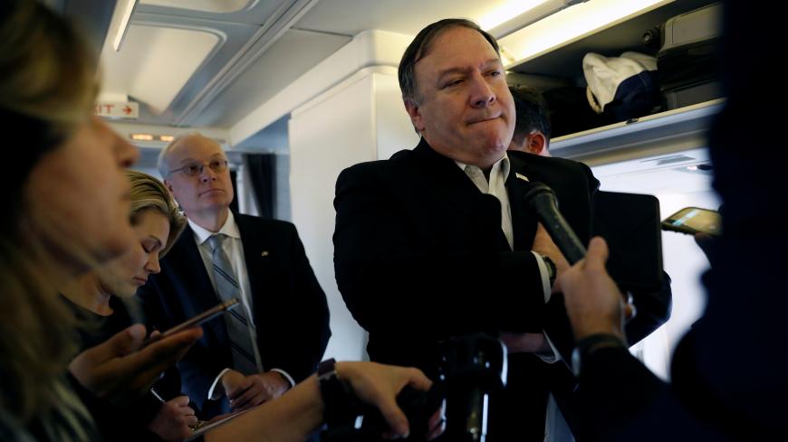 U.S. Secretary of State Mike Pompeo speaks to reporters while his plane refuels in Brussels, Belgium October 17, 2018. REUTERS/Leah Millis/Pool - RC125E4B4F30