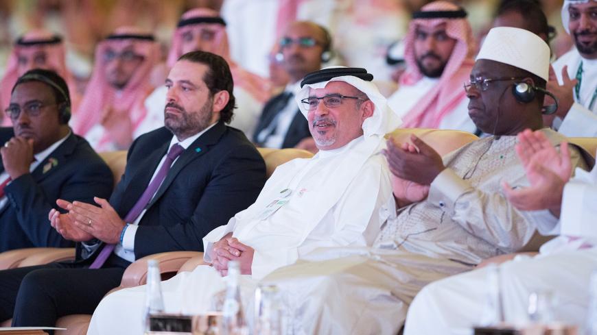 Bahrain's Crown Prince Salman bin Hamad al-Khalifa, Senegal's President Macky Sall and Lebanese Prime Minister Saad al-Hariri attend the Future Investment Initiative Forum in Riyadh, Saudi Arabia October 24, 2018.  Bandar Algaloud/Courtesy of Saudi Royal Court/Handout via REUTERS ATTENTION EDITORS - THIS PICTURE WAS PROVIDED BY A THIRD PARTY. - RC12E74599F0