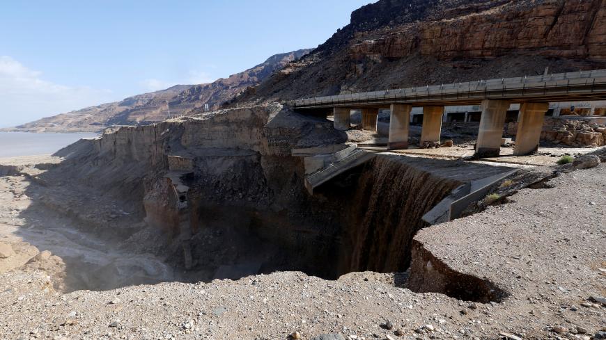 A general view shows the location of the accident where rain storms unleashed flash floods, near the Dead Sea, Jordan October 26, 2018. REUTERS/Muhammad Hamed - RC12C7E52190