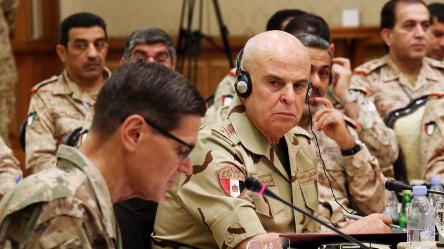 Egyptian armed forces Chief of Staff Mohamed Farid Hegazy (R) looks on as Joseph Leonard Votel, Commander of United States Central Command, speaks during a meeting with the Gulf cooperation council's armed forces chiefs of staff in Kuwait City on September 12, 2018. - Gulf Arab army chiefs, including Qatar's military commander, are meeting with US Central Command officials for talks on defence cooperation. (Photo by Yasser Al-Zayyat / AFP)        (Photo credit should read YASSER AL-ZAYYAT/AFP/Getty Images)