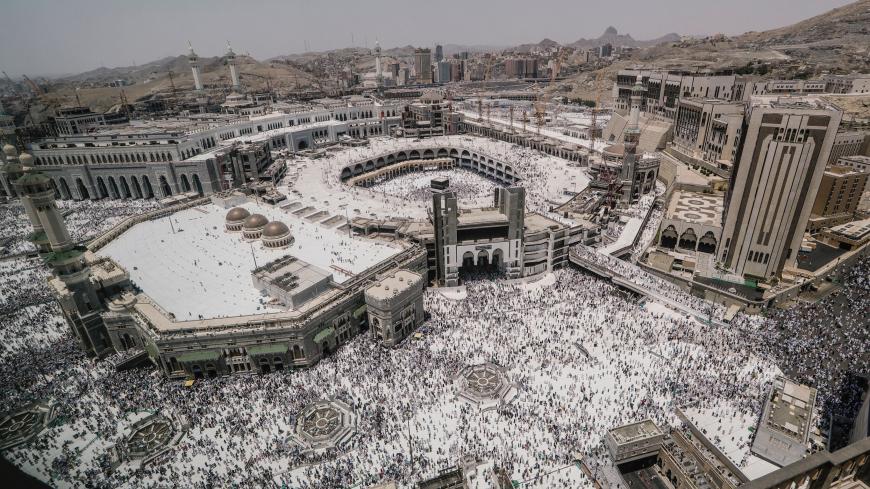 Muslim pilgrims walk out after the Friday prayer at the Grand mosque ahead of annual Haj pilgrimage in the holy city of Mecca, Saudi Arabia  August 17, 2018. REUTERS/Zohra Bensemra - RC1615A76DE0
