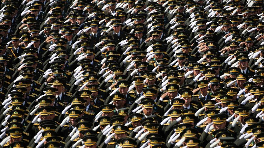 Turkish army officers stand at attention during a ceremony marking the 96th anniversary of Victory Day at the mausoleum of Mustafa Kemal Ataturk in Ankara, Turkey August 30, 2018. REUTERS/Umit Bektas      TPX IMAGES OF THE DAY - RC173FEBAEE0
