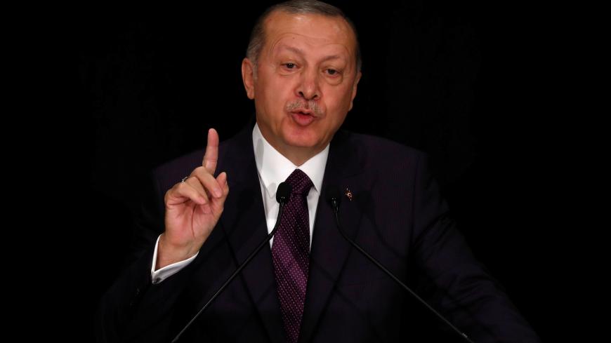 Turkish President Tayyip Erdogan addresses teachers and students at Kabatas High School in Istanbul, Turkey September 18, 2018. REUTERS/Murad Sezer - RC15BE5F08A0