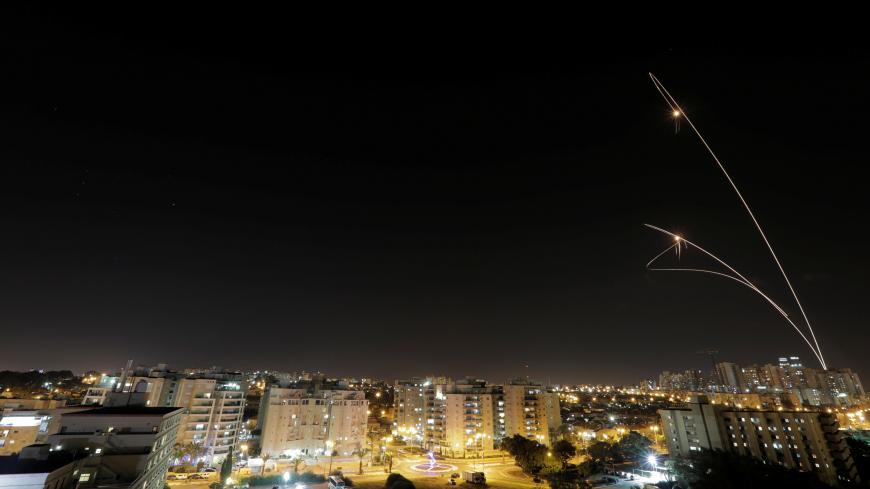 A general view of the Israeli city of Ashkelon, as an Iron Dome anti-missile fires near the Israeli side of the Israel-Gaza border, November 12, 2018. REUTERS/ Amir Cohen - RC1AEE5946D0