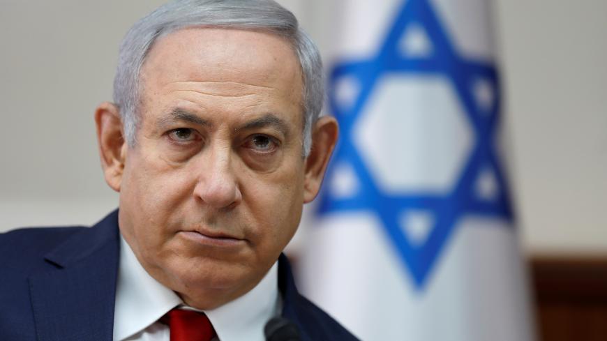 Israel's Prime Minister Benjamin Netanyahu chairs the weekly cabinet meeting in Jerusalem November 18, 2018. Abir Sultan/Pool via REUTERS - RC1E94DE3E10