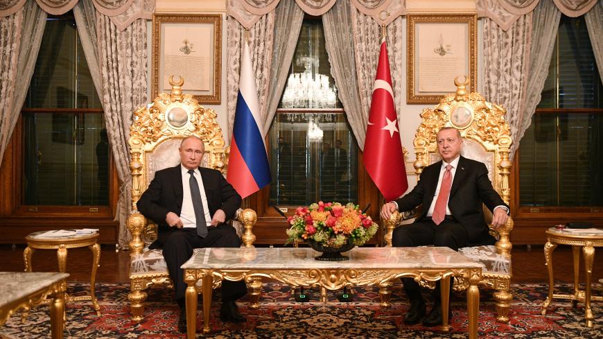 Russian President Vladimir Putin (L) meets with his Turkish counterpart Tayyip Erdogan in Istanbul, Turkey November 19, 2018. Sputnik/Ramil Sitdikov/Pool via REUTERS  ATTENTION EDITORS - THIS IMAGE WAS PROVIDED BY A THIRD PARTY. - UP1EEBJ18SBRX