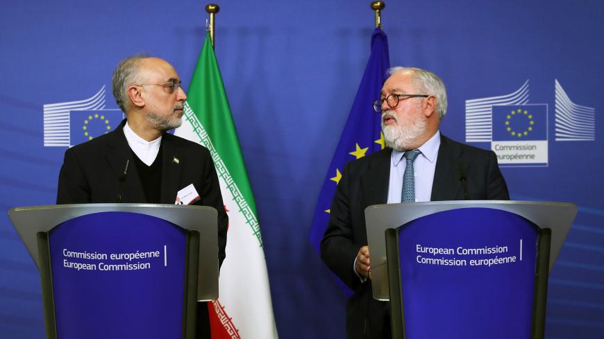 EU Energy Commissioner Miguel Arias Canete and Iran's nuclear chief Ali Akbar Salehi hold a joint news conference at the EC headquarters in Brussels, Belgium November 26, 2018.  REUTERS/Yves Herman - RC11C823E6B0
