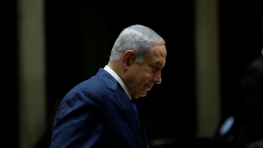 Israeli Prime Minister Benjamin Netanyahu attends a ceremony awarding people who contributed in the fight against human trafficking, in Jerusalem December 2, 2018. REUTERS/Ronen Zvulun - RC1137278E60