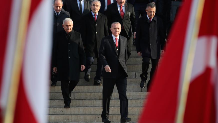 Turkish President Tayyip Erdogan attends a ceremony as he is flanked by top officials and army officers at the mausoleum of Mustafa Kemal Ataturk, marking Ataturk's death anniversary, in Ankara, Turkey November 10, 2018. REUTERS/Umit Bektas - RC1985BEED00