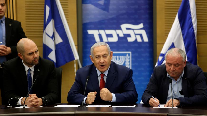 Israeli Prime Minister Benjamin Netanyahu (C) delivers a statement at the Israeli Parliament in Jerusalem, on December 24, 2018. - Israel's government decided to hold early elections in April with Prime Minister Benjamin Netanyahu struggling to keep together a one-seat majority in parliament as he also faces potential corruption charges in the months ahead. (Photo by Marc Israel SELLEM / AFP) / Israel OUT        (Photo credit should read MARC ISRAEL SELLEM/AFP/Getty Images)