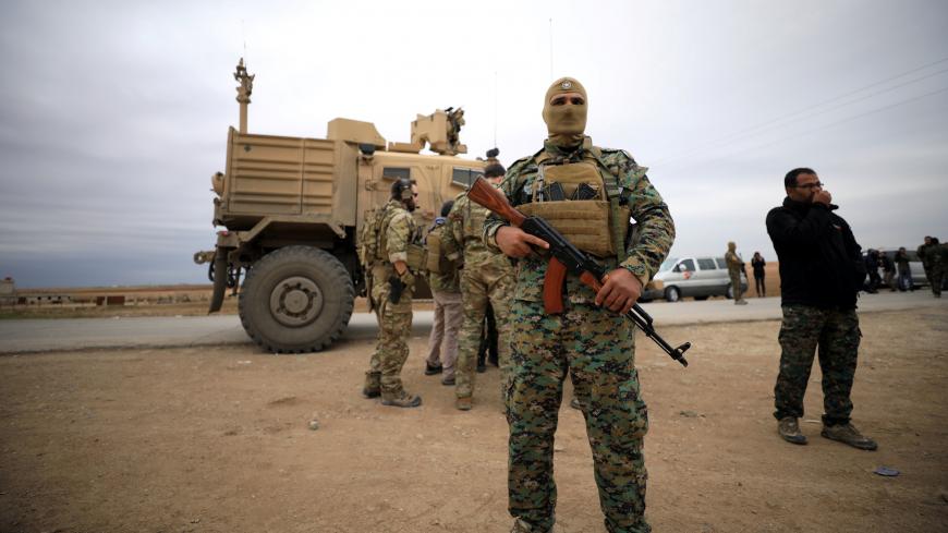 Syrian Democratic Forces and U.S. troops are seen during a patrol near Turkish border in Hasakah, Syria November 4, 2018. REUTERS/Rodi Said - RC1A340091B0