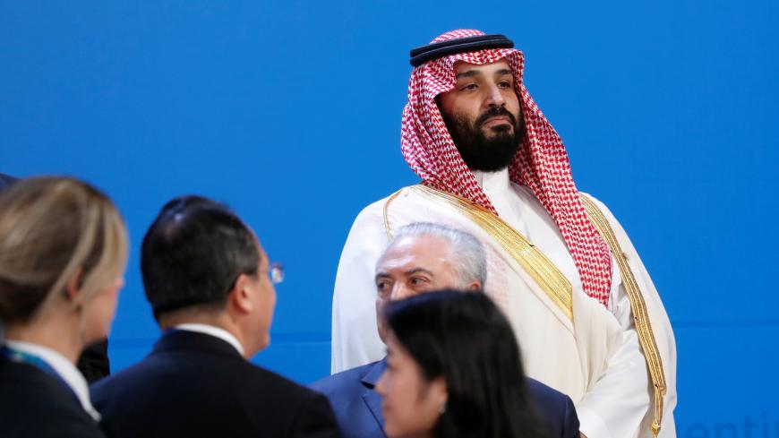 Saudi Crown Prince Mohammed bin Salman looks out as leaders arrive for a family photo at the G20 in Buenos Aires, Argentina November 30, 2018. REUTERS/Kevin Lamarque - RC1CF27DCB60