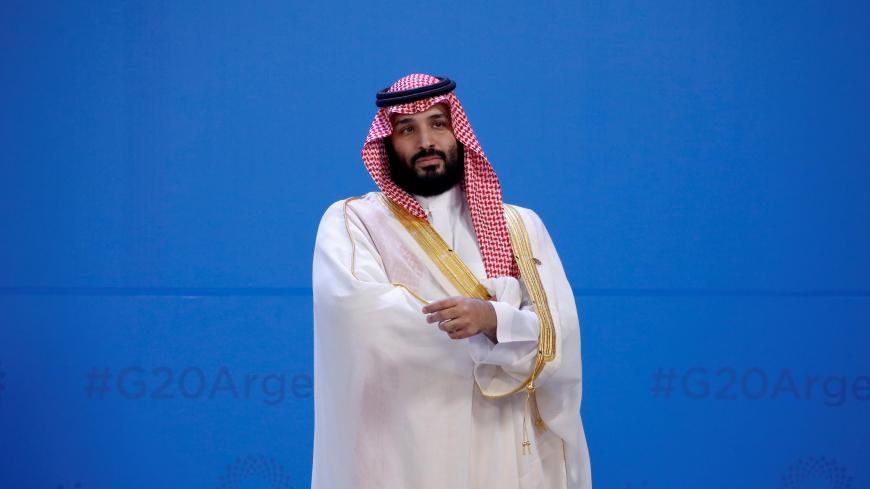 Saudi Arabia's Crown Prince Mohammed bin Salman waits for the family photo during the G20 summit in Buenos Aires, Argentina November 30, 2018. REUTERS/Andres Martinez Casares/Pool     TPX IMAGES OF THE DAY - RC149554C0C0